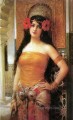 hermosa chica árabe con mujer de flores rojas